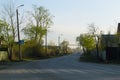 Evening landscape with a road on which cars are driving Royalty Free Stock Photo