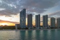 Evening landscape of sandy beachfront in Sunny Isles Beach city with luxurious highrise hotels and condo buildings on Royalty Free Stock Photo