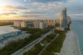 Evening landscape of sandy beachfront in Sunny Isles Beach city with luxurious highrise hotels and condo buildings on Royalty Free Stock Photo