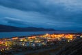 Evening landscape with a small seaside town in the Arctic in Chukotka Royalty Free Stock Photo