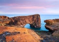 Evening landscape with views of the rocky cape and ocean in Iceland