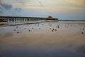 The evening light pier beach. Saplee Chumphon. Royalty Free Stock Photo