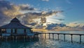 Evening in the Maldives. The house stands on a wooden platform above the ocean. Royalty Free Stock Photo