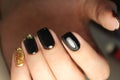 Manicure design black and gold color