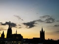 The Cologne Cathedral and the Great St Martins Church as a silhouette at sunset