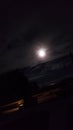 Evening moon cloudy