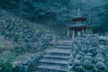 Evening near historic buddhist temple. Hundreds of stone statues in the garden. Buddhist shrine in Otagi Nenbutsu-ji, Kyoto, Japan Royalty Free Stock Photo