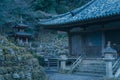 Evening near historic buddhist temple. Hundreds of stone statues in the garden. Buddhist shrine in Otagi Nenbutsu-ji, Kyoto, Japan Royalty Free Stock Photo