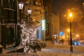 Winter night landscape, evening in the night snowy street under snowfall