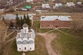 Evening old Suzdal cityscape from rooftop. Wall of Rizopolozhensky monastery Royalty Free Stock Photo