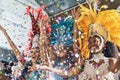 The evening is ours and the music is our friend. beautiful samba dancers performing in a carnival with their band. Royalty Free Stock Photo