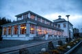 Evening outdoor view of the lighted restaurant on Mount Floyen, which lies above the town of Bergen in Norway