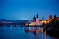 Evening over river Vltava near Charles bridge in Prague Royalty Free Stock Photo