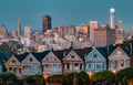 Evening, Painted Ladies Victorian houses in Alamo Square and a view of the San Francisco skyline and skyscrapers. Photo processed Royalty Free Stock Photo