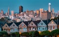 Evening, Painted Ladies Victorian houses in Alamo Square and a view of the San Francisco skyline and skyscrapers. Photo processed Royalty Free Stock Photo