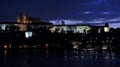 Summer night view of Charles Bridge over the Vltava in the historical part of Prague Royalty Free Stock Photo