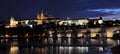 Summer night view of Charles Bridge over the Vltava in the historical part of Prague Royalty Free Stock Photo