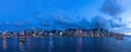 Evening panoramic view of the lighted Victoria Harbour in HK