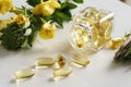 Evening primrose oil in gel capsules in a glass bottle Royalty Free Stock Photo