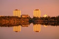 Downtown Yellowknife Buildings reflected in Frame Lake in Evening Light, Northwest Territories, Canada