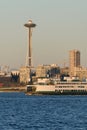 Evening sailing of Washington State Ferry in front of Space Needle Royalty Free Stock Photo