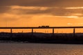 Evening scene of bridge with truck crossing Royalty Free Stock Photo