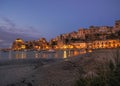 Evening scene in an harbour in Sicily