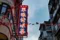 Evening scene with neon lights of Hong Kong's Temple Street Night Market in Yau Ma Tei, Kowloon Royalty Free Stock Photo