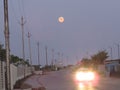 Dusky Road Horizon, with Full Moon in Sky.