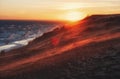 evening Sea or lake with large sand dunes during sunset. Landscape with wind on the Kapchagay reservoir in Kazakhstan Almaty Royalty Free Stock Photo