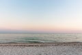 Evening seascape with dramatic sky. Summer nature. Scenic sunset sky over island beach. Tranquility concept. Scenic coastline.