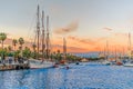 Evening seascape at Port Vell with a pirate galleon and many yachts Royalty Free Stock Photo