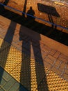 Evening shadows on a train station