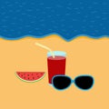 Evening shore with glasses, watermelon and drink in a glass