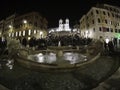 Evening shot - Tourists at Spanish Steps and a boat-shaped Fontana della Barcacciaon Piazza di Spagna in Rome, Italy, April, 2019 Royalty Free Stock Photo