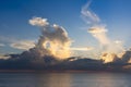 Evening sky with dramatic clouds over the sea with sculpted 3D cloudscape