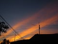 Evening sky, light through the clouds in a beautiful orange beam.