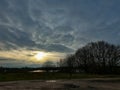 evening sky over the fields overcast with thunderclouds sunset