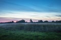 Evening sky over a foggy meadow, Zarzecze, Poland Royalty Free Stock Photo