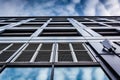 Evening sky reflections on the side of a modern building in Baltimore, Maryland. Royalty Free Stock Photo