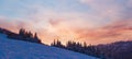 Evening sky with yellow clouds over winter Ukrainian Carpathian Mountains Royalty Free Stock Photo