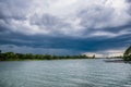 Evening storm over river and dramatic sky and clouds Royalty Free Stock Photo