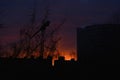 Evening street view roofs houses and cranes building colorful sky background in the Minsk Belarus