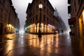 Evening streets of the old town with bright orange lanterns reflecting off the wet cobblestones in the rain with fog and