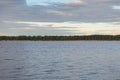 Evening summer landscape with opposite bank of the river with a forest Royalty Free Stock Photo