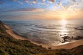 Evening summer ocean view over Carriagem beach at low tide Aljezur, Algarve, Portugal Royalty Free Stock Photo