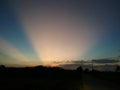 Evening sun, dark sky Royalty Free Stock Photo
