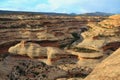 Evening Sun on the Layered Landscape of Anderson Canyon near Sipapu Bridge, Natural Bridges National Monument, Utah, USA Royalty Free Stock Photo