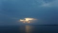 Evening sun over sea. Cloudy sky, sunset Royalty Free Stock Photo