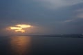 Evening sun over the sea. Cloudy sky, sunset Royalty Free Stock Photo